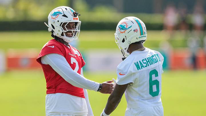 Jul 30, 2026; Miami Gardens, FL, USA; Miami Dolphins quarterback Malik Willis (2) shakes hands with wide receiver Malik Washington (6) during practice at Baptist Health Training Complex. Mandatory Credit: Sam Navarro-Imagn Images Jul 30, 2026; Miami Gardens, FL, USA; Miami Dolphins quarterback Malik Willis (2) shakes hands with wide receiver Malik Washington (6) during practice at Baptist Health Training Complex. Mandatory Credit: Sam Navarro-Imagn Images