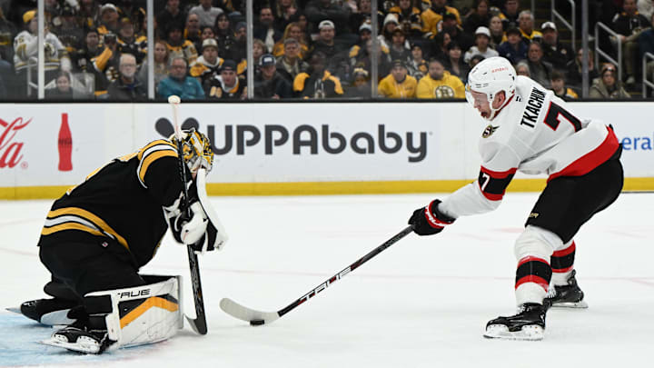 Nov 9, 2024; Boston, Massachusetts, USA; Ottawa Senators left wing Brady Tkachuk (7) attempts a shot on Boston Bruins goaltender Jeremy Swayman (1) during the second period at TD Garden. Mandatory Credit: Brian Fluharty-Imagn Images