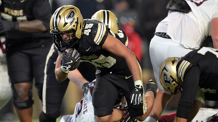Purdue Boilermakers running back Devin Mockobee (45) jumps into the end zone