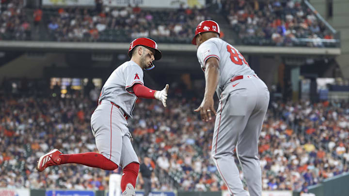 Sep 22, 2024; Houston, Texas, USA; Los Angeles Angels shortstop Zach Neto (9) celebrates with first base coach Bo Porter (88) after hitting a home run during the eighth inning against the Houston Astros at Minute Maid Park. Mandatory Credit: Troy Taormina-Imagn Images Sep 22, 2024; Houston, Texas, USA; Los Angeles Angels shortstop Zach Neto (9) celebrates with first base coach Bo Porter (88) after hitting a home run during the eighth inning against the Houston Astros at Minute Maid Park. Mandatory Credit: Troy Taormina-Imagn Images