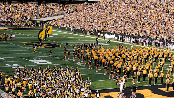 The Iowa Hawkeyes team takes the field against the Albany Great Danes during the Swarm Aug. 30, 2025 at Kinnick Stadium in Iowa City, Iowa.