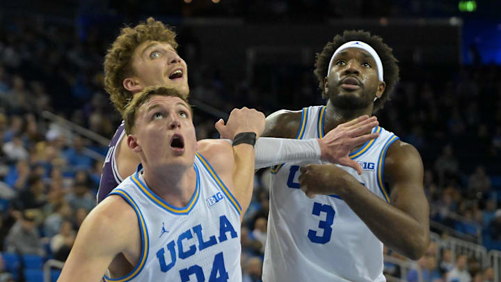 Jan 24, 2026; Los Angeles, California, USA;  UCLA Bruins forward Tyler Bilodeau (34) and guard Eric Dailey Jr. (3) box out Northwestern Wildcats forward Nick Martinelli (2) in the second half at Pauley Pavilion presented by Wescom Financial. Mandatory Credit: Jayne Kamin-Oncea-Imagn Images