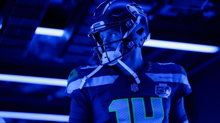 Sep 21, 2025; Seattle, Washington, USA; Seattle Seahawks quarterback Sam Darnold (14) enters the field before the game against the New Orleans Saints at Lumen Field. Mandatory Credit: Joe Nicholson-Imagn Images