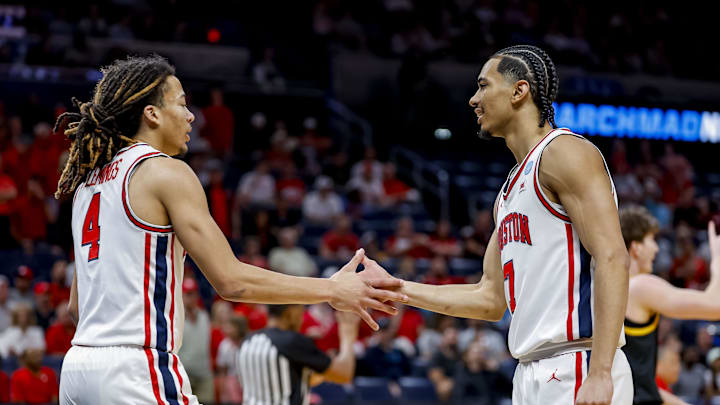 Mar 19, 2026; Oklahoma City, OK, USA; Houston Cougars center Cedric Lath (8) and Houston Cougars guard Kingston Flemings (4) high five during a first round game of the men's 2026 NCAA Tournament at Paycom Center. Mandatory Credit: Alonzo Adams-Imagn Images