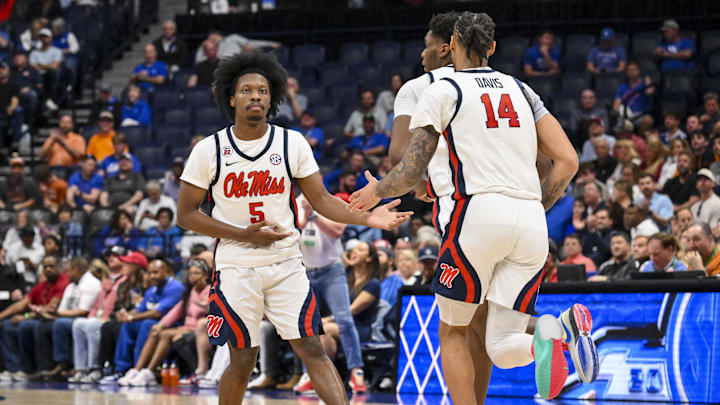Mar 13, 2025; Nashville, TN, USA; Mississippi Rebels guard Jaylen Murray (5) reacts after a made three point basket against the Arkansas Razorbacks during the first half at Bridgestone Arena. Mandatory Credit: Steve Roberts-Imagn Images Mar 13, 2025; Nashville, TN, USA; Mississippi Rebels guard Jaylen Murray (5) reacts after a made three point basket against the Arkansas Razorbacks during the first half at Bridgestone Arena. Mandatory Credit: Steve Roberts-Imagn Images