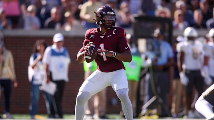 Oct 11, 2025; Atlanta, Ga.; Virginia Tech quarterback Kyron Drones (1) throws a pass against Georgia Tech. Oct 11, 2025; Atlanta, Ga.; Virginia Tech quarterback Kyron Drones (1) throws a pass against Georgia Tech.