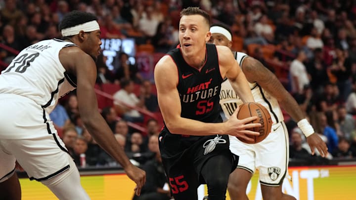 Nov 16, 2023; Miami, Florida, USA;  Miami Heat forward Duncan Robinson (55) drives to the basket as