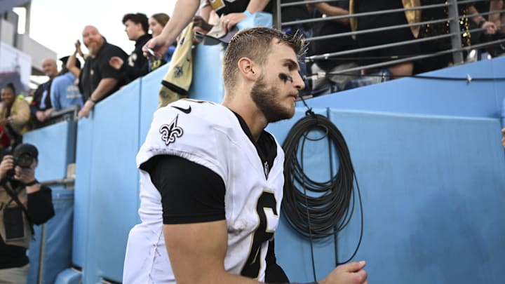 Dec 28, 2025; Nashville, Tennessee, USA;  New Orleans Saints quarterback Tyler Shough (6) celebrates win against the Tennessee Titans after the game at Nissan Stadium. Mandatory Credit: Steve Roberts-Imagn Images