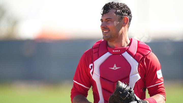 Cincinnati Reds catcher Luke Maile (22) smiles