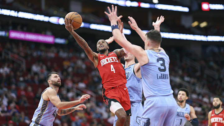 Oct 25, 2024; Houston, Texas, USA; Houston Rockets guard Jalen Green (4) shoots the ball during the fourth quarter against the Memphis Grizzlies at Toyota Center. Mandatory Credit: Troy Taormina-Imagn Images