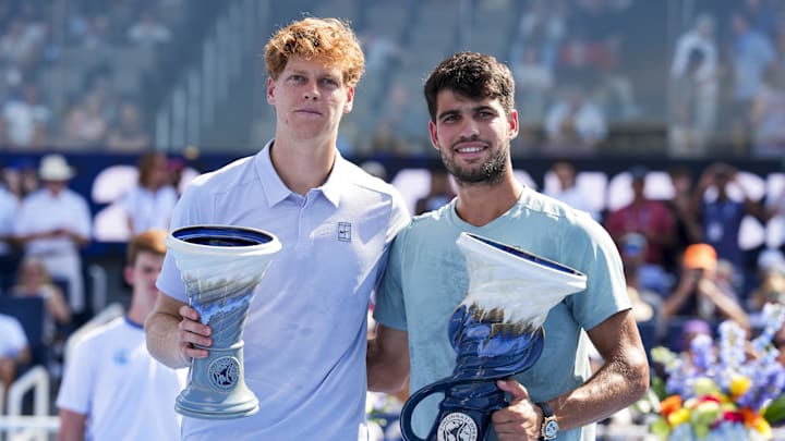 Aug 18, 2025; Cincinnati, OH, USA; Jannik Sinner (ITA) and Carlos Alcaraz (ESP) pose for a photo after their match during the Cincinnati Open at the Lindner Family Tennis Center. Aug 18, 2025; Cincinnati, OH, USA; Jannik Sinner (ITA) and Carlos Alcaraz (ESP) pose for a photo after their match during the Cincinnati Open at the Lindner Family Tennis Center.