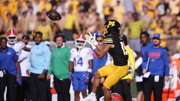 Oct 3, 2026; Columbia, Missouri, USA; Missouri Tigers wide receiver Cayden Lee (19) catches the ball in the second quarter against the Florida Gators at Faurot Field at Memorial Stadium. Mandatory Credit: William Purnell-Imagn Images Oct 3, 2026; Columbia, Missouri, USA; Missouri Tigers wide receiver Cayden Lee (19) catches the ball in the second quarter against the Florida Gators at Faurot Field at Memorial Stadium. Mandatory Credit: William Purnell-Imagn Images