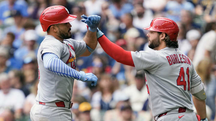 Jun 15, 2025; Milwaukee, Wisconsin, USA;  St. Louis Cardinals catcher Ivan Herrera (48) is greeted by first baseman Alec Burleson (41) after hitting a home run during the eighth inning against the Milwaukee Brewers at American Family Field. Mandatory Credit: Jeff Hanisch-Imagn Images