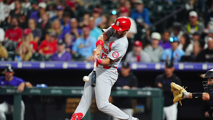 St. Louis Cardinals designated hitter Matt Carpenter (13) doubles in the seventh inning against the Colorado Rockies at Coors Field on Sept 24. St. Louis Cardinals designated hitter Matt Carpenter (13) doubles in the seventh inning against the Colorado Rockies at Coors Field on Sept 24.