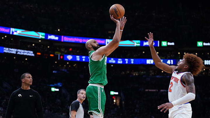 Oct 22, 2024; Boston, Massachusetts, USA; Boston Celtics guard Derrick White (9) makes a three-point basket against New York Knicks guard Miles McBride (2) in the second quarter at TD Garden. Mandatory Credit: David Butler II-Imagn Images Oct 22, 2024; Boston, Massachusetts, USA; Boston Celtics guard Derrick White (9) makes a three-point basket against New York Knicks guard Miles McBride (2) in the second quarter at TD Garden. Mandatory Credit: David Butler II-Imagn Images