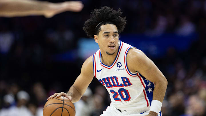 Nov 2, 2024; Philadelphia, Pennsylvania, USA; Philadelphia 76ers guard Jared McCain (20) dribbles the ball against the Memphis Grizzlies during the second quarter at Wells Fargo Center. Mandatory Credit: Bill Streicher-Imagn Images