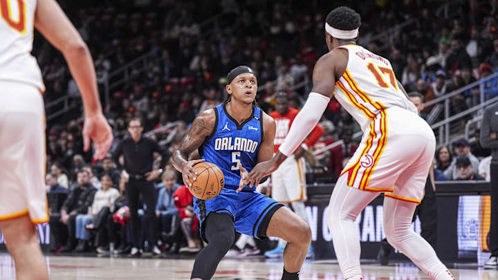 Feb 20, 2025; Atlanta, Georgia, USA; Orlando Magic forward Paolo Banchero (5) pulls up to shoot against Atlanta Hawks forward Onyeka Okongwu (17) during the first half at State Farm Arena. Mandatory Credit: Dale Zanine-Imagn Images Feb 20, 2025; Atlanta, Georgia, USA; Orlando Magic forward Paolo Banchero (5) pulls up to shoot against Atlanta Hawks forward Onyeka Okongwu (17) during the first half at State Farm Arena. Mandatory Credit: Dale Zanine-Imagn Images