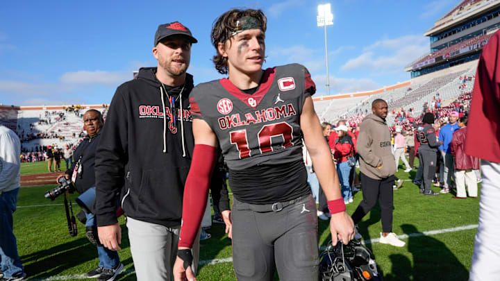 Oklahoma quarterback John Mateer, offensive coordinator Ben Arbuckle Oklahoma quarterback John Mateer, offensive coordinator Ben Arbuckle