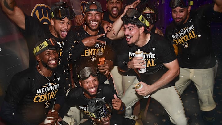 Sep 18, 2024; Milwaukee, Wisconsin, USA; Milwaukee Brewers celebrates after beating the Philadelphia Phillies and clinching the NL Central Division Championship at American Family Field. Mandatory Credit: Benny Sieu-Imagn Images