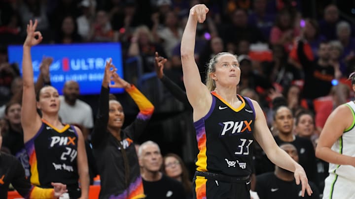 Phoenix Mercury guard Sami Whitcomb (33) watches her 3-point shot during their WNBA semifinal playoff game against the Minnesota Lynx at PHX Arena on Sept. 28, 2025.