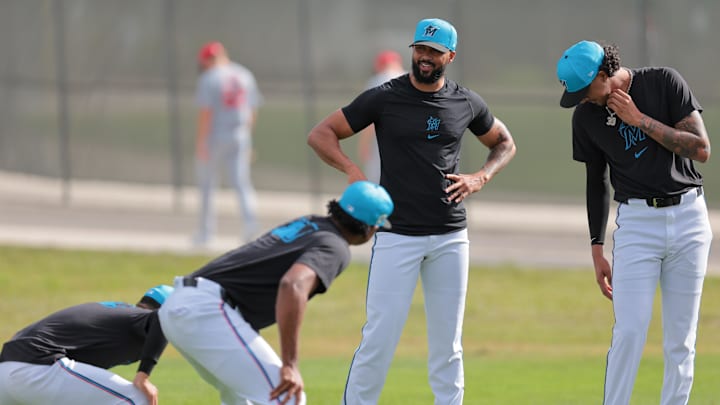 Feb 13, 2025; Jupiter, FL, USA; Miami Marlins starting pitcher Sandy Alcantara (22) talks to his teammates during spring training at the Miami Marlins player development camp; scouting complex. Mandatory Credit: Sam Navarro-Imagn Images Feb 13, 2025; Jupiter, FL, USA; Miami Marlins starting pitcher Sandy Alcantara (22) talks to his teammates during spring training at the Miami Marlins player development camp; scouting complex. Mandatory Credit: Sam Navarro-Imagn Images
