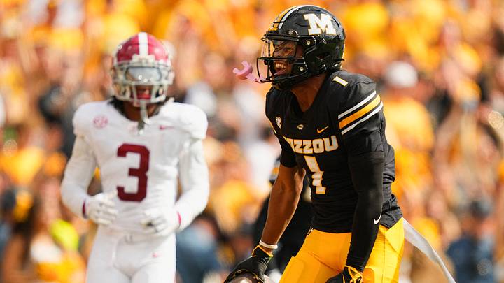 Oct 11, 2025; Columbia, Missouri, USA; Missouri Tigers wide receiver Donovan Olugbode (1) celebrates after a catch against Alabama Crimson Tide defensive back Keon Sabb (3) during the second half of the game at Faurot Field at Memorial Stadium. Mandatory Credit: Jay Biggerstaff-Imagn Images Oct 11, 2025; Columbia, Missouri, USA; Missouri Tigers wide receiver Donovan Olugbode (1) celebrates after a catch against Alabama Crimson Tide defensive back Keon Sabb (3) during the second half of the game at Faurot Field at Memorial Stadium. Mandatory Credit: Jay Biggerstaff-Imagn Images