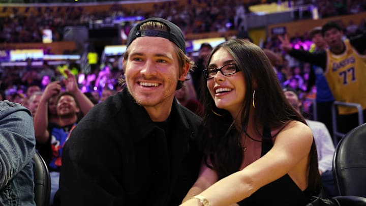 Justin Herbert and Madison Beer sit courtside at the Laker game Friday at the Staples Center. Lebron James stopped by to say hello. Justin Herbert and Madison Beer sit courtside at the Laker game Friday at the Staples Center. Lebron James stopped by to say hello.