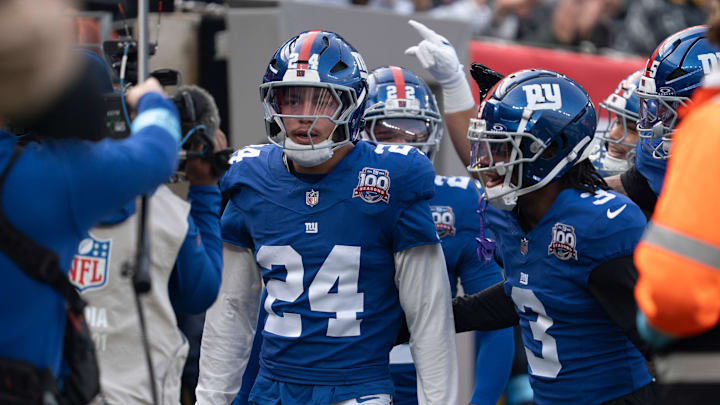 New York Giants safety Dane Belton (24) celebrates after catching an interception during a game between New York Giants and Indianapolis Colts at MetLife Stadium on Sunday, Dec. 29, 2024.