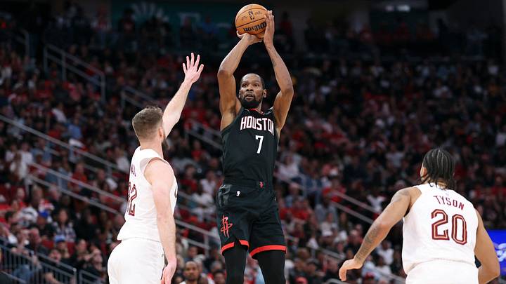 Dec 27, 2025; Houston, Texas, USA;  Houston Rockets forward Kevin Durant (7) shoots the ball as Cleveland Cavaliers forward Dean Wade (32) defends during the third quarter at Toyota Center. 