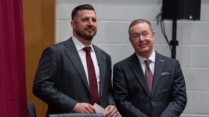 Florida State University’s new men’s basketball coach Luke Loucks stands with FSU Athletic Director Michael Alford before a press conference Monday, March 10, 2025.