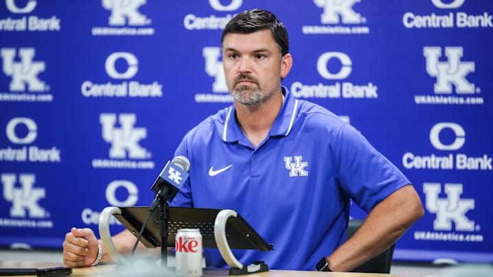 UK defensive coach Brad White talks to reporters during the Media Day event Frida,  Aug. 4, 2023.