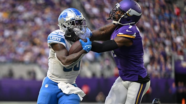 Sep 25, 2022; Minneapolis, Minnesota, USA; Detroit Lions running back Jamaal Williams (30) scores a