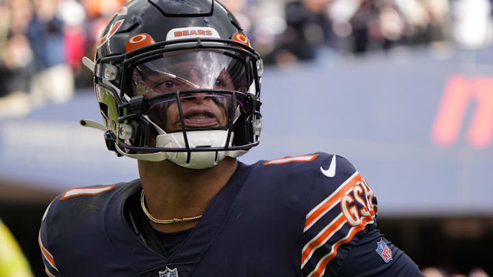 Former Chicago Bears quarterback Justin Fields (1) reacts after a touchdown against the San Francisco 49ers during the second half at Soldier Field.