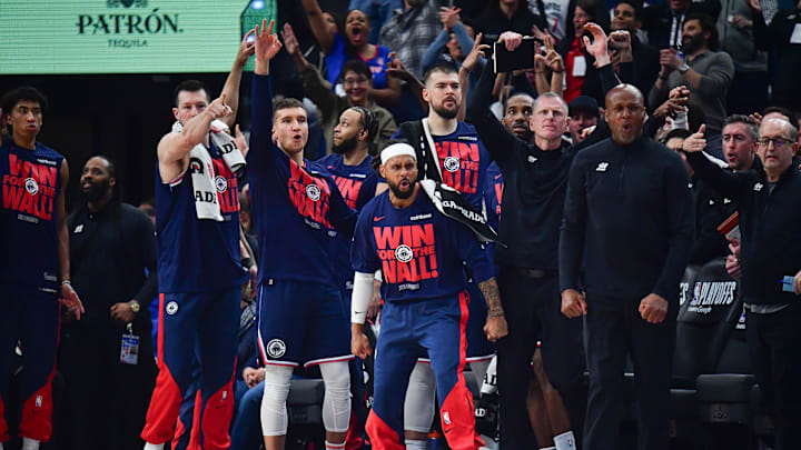 Apr 24, 2025; Inglewood, California, USA; Los Angeles Clippers guard Patty Mills (88) and the bench react against the Denver Nuggets during the first half of game three in the first round for the 2024 NBA Playoffs at Intuit Dome. Mandatory Credit: Gary A. Vasquez-Imagn Images