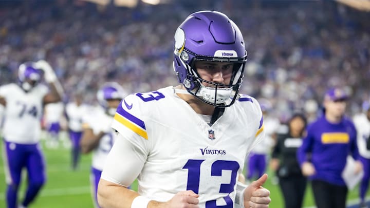 Jan 13, 2025; Glendale, AZ, USA; Minnesota Vikings quarterback Daniel Jones (13) against the Los Angeles Rams during an NFC wild card game at State Farm Stadium. Mandatory Credit: Mark J. Rebilas-Imagn Images
