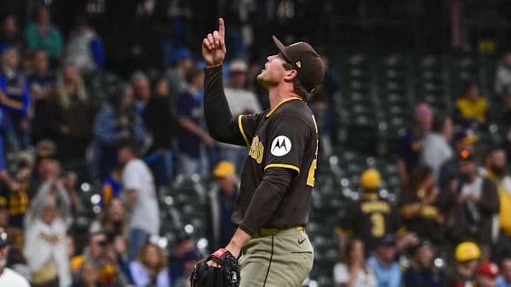 May 13, 2026; Milwaukee, Wisconsin, USA; San Diego Padres pitcher Mason Miller (22) reacts after picking up a save against the Milwaukee Brewers at American Family Field. Mandatory Credit: Benny Sieu-Imagn Images