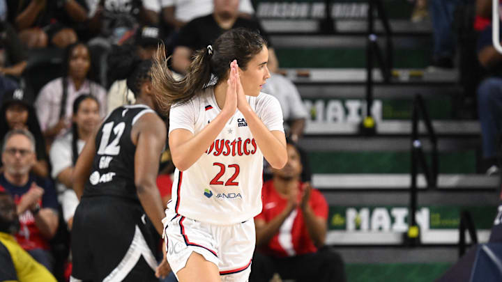Jul 10, 2025; Washington, District of Columbia, USA; Washington Mystics guard Sonia Citron (22) reacts after scoring a basket against the Las Vegas Aces during the fourth quarter at EagleBank Arena. Mandatory Credit: Rafael Suanes-Imagn Images