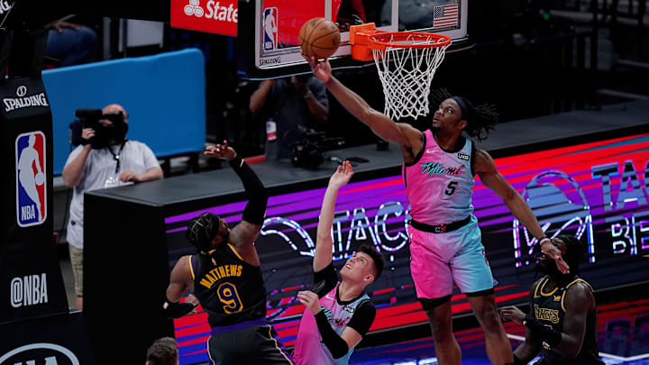 Apr 8, 2021; Miami, Florida, USA; Miami Heat forward Precious Achiuwa (5) blocks the shot of Los Angeles Lakers guard Wesley Matthews (9) during the second half at American Airlines Arena. Mandatory Credit: Jasen Vinlove-Imagn Images