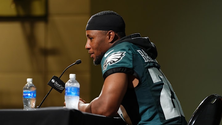 Saquon Barkley talks to reporters at an Eagles minicamp.