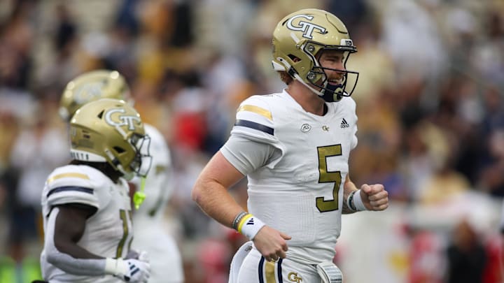 Sep 14, 2024; Atlanta, Georgia, USA; Georgia Tech Yellow Jackets quarterback Zach Pyron (5) celebrates after a touchdown run against the Virginia Military Institute Keydets in the first quarter at Bobby Dodd Stadium at Hyundai Field. Mandatory Credit: Brett Davis-Imagn Images Sep 14, 2024; Atlanta, Georgia, USA; Georgia Tech Yellow Jackets quarterback Zach Pyron (5) celebrates after a touchdown run against the Virginia Military Institute Keydets in the first quarter at Bobby Dodd Stadium at Hyundai Field. Mandatory Credit: Brett Davis-Imagn Images
