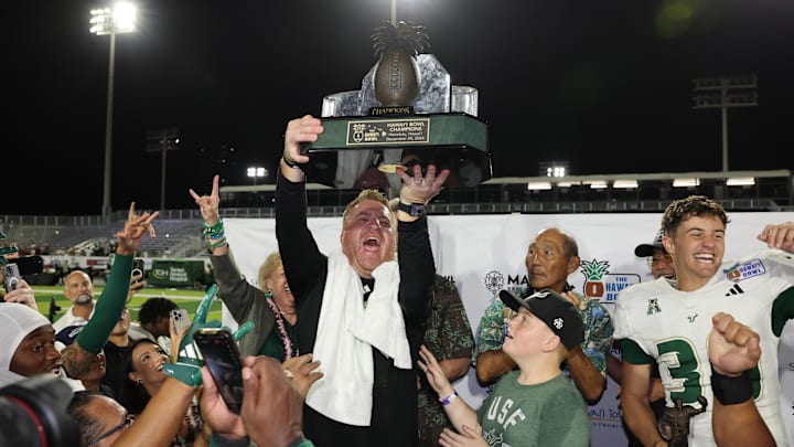 USF coach Alex Golesh celebrated the Bulls' five-overtime win in the Hawaii Bowl but is back on the recruiting trail.