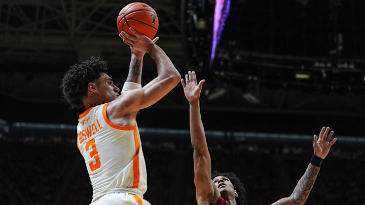Tennessee guard Bishop Boswell (3) shoots the ball in front of Alabama guard Aden Holloway (2) during a NCAA basketball game between Tennessee and Alabama at Thompson-Boling Arena at Food City Center in Knoxville, Tenn., on Feb. 28, 2026. Tennessee guard Bishop Boswell (3) shoots the ball in front of Alabama guard Aden Holloway (2) during a NCAA basketball game between Tennessee and Alabama at Thompson-Boling Arena at Food City Center in Knoxville, Tenn., on Feb. 28, 2026.