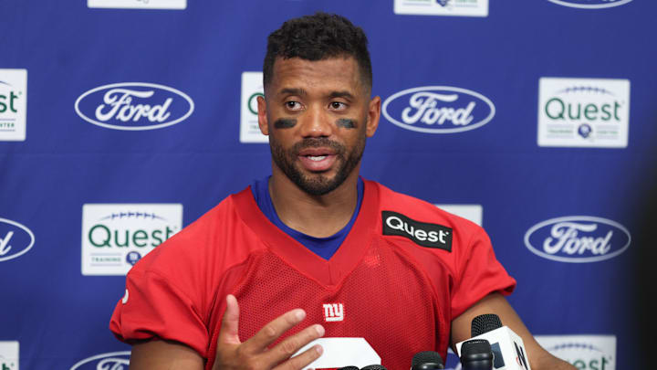 Jul 23, 2025; East Rutherford, NJ, USA; New York Giants quarterback Russell Wilson (3) talks with media during training camp at Quest Diagnostics Training Center.  