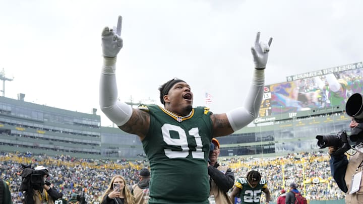  Green Bay Packers defensive lineman Preston Smith (91) celebrates following the game against the Arizona Cardinals at Lambeau Field.