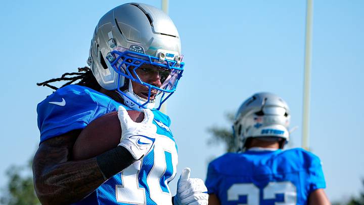 Detroit Lions running back Isiah Pacheco (10) practices during training camp