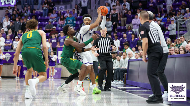 TCU forward Micah Robinson gets ready to pass in the Horned Frogs' 69-63 win over Baylor on Saturday, Jan. 3 at Schollmaier Arena in Fort Worth, TX TCU forward Micah Robinson gets ready to pass in the Horned Frogs' 69-63 win over Baylor on Saturday, Jan. 3 at Schollmaier Arena in Fort Worth, TX