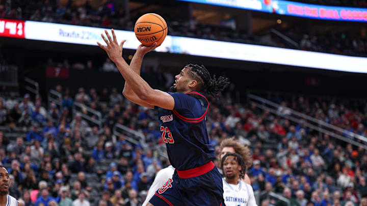Mar 6, 2026; Newark, New Jersey, USA; St. John's basketball forward Bryce Hopkins (23) goes to the basket against the Seton Hall Pirates during the first half at Prudential Center.