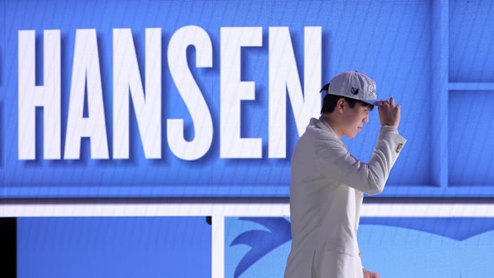 Jun 25, 2025; Brooklyn, NY, USA; Yang Hansen looks on after being selected as the 16th pick by the Memphis Grizzlies in the first round of the 2025 NBA Draft at Barclays Center. Mandatory Credit: Brad Penner-Imagn Images Jun 25, 2025; Brooklyn, NY, USA; Yang Hansen looks on after being selected as the 16th pick by the Memphis Grizzlies in the first round of the 2025 NBA Draft at Barclays Center. Mandatory Credit: Brad Penner-Imagn Images