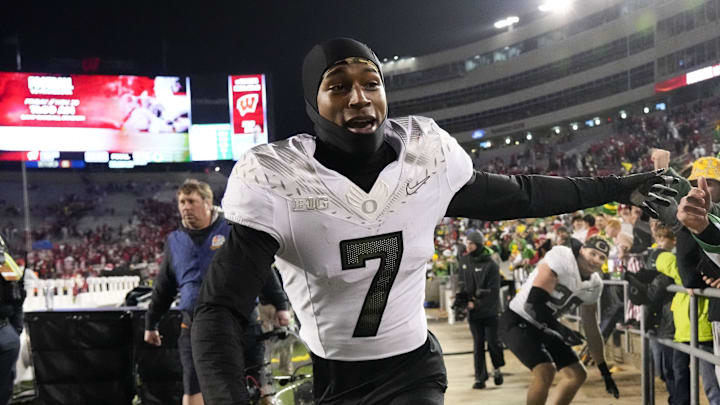 Nov 16, 2024; Madison, Wisconsin, USA; Oregon Ducks wide receiver Evan Stewart (7) greets fans following the game against the Wisconsin Badgers at Camp Randall Stadium. Mandatory Credit: Jeff Hanisch-Imagn Images Nov 16, 2024; Madison, Wisconsin, USA; Oregon Ducks wide receiver Evan Stewart (7) greets fans following the game against the Wisconsin Badgers at Camp Randall Stadium. Mandatory Credit: Jeff Hanisch-Imagn Images