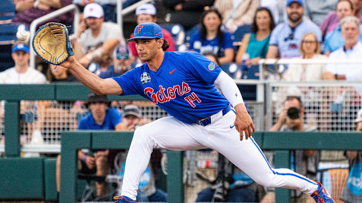 Florida Gators first baseman Jac Caglianone (14) gets an out against the Texas A&M Aggies during the fourth inning at Charles Schwab Field Omaha in 2024.